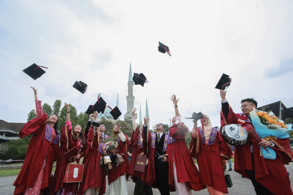 UTM Graduates celebrating their success after their convocation ceremony.