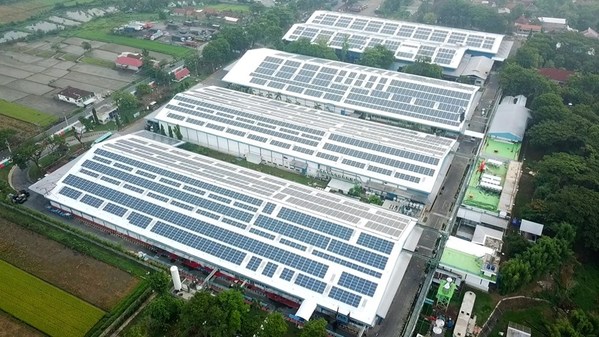 Solar panels installed on rooftops of Danone’s Klaten factory, system developed, built and operated by Total Solar DG