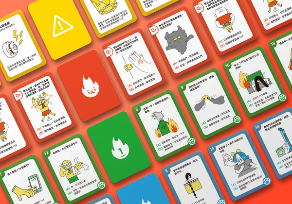 「Match Cat」ボードゲームはビル火災をシミュレーションし、プレーヤーが緊急脱出ルートを考えるよう導く。