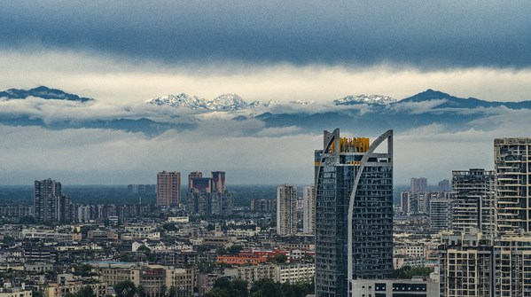 Chengdu offers a snow-capped mountain view.
