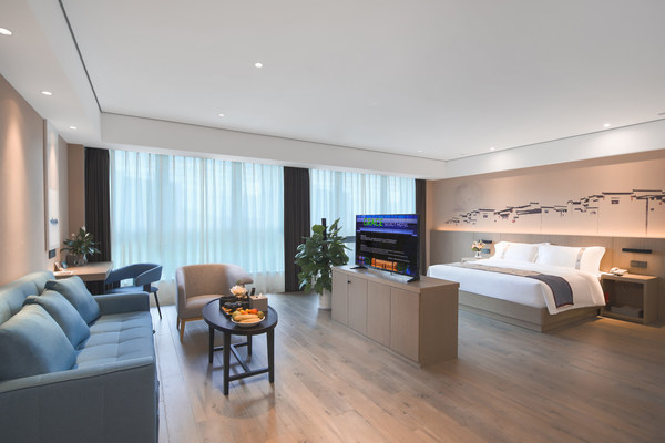 重庆江北嘴金融城格雷斯精选酒店舒适简约的客房宽敞明亮，多种房型可满足不同出行目的。