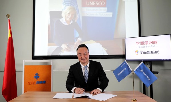 UNESCO Assistant Director-General for Education Stefania Giannini signs a strategic cooperation agreement with TAL Education Group Executive President Wan Yiting, Dec. 7, 2020.