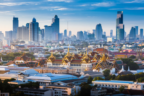 The Golden Grand Palace of Bangkok. with skyscraper view of cityscape at sunrise time. The most favorite landmark of travel destination of asia. Best of amazing beautiful scene of Thailand.