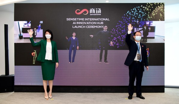 Guest of Honour Ms Sun Xueling, Minister of State, Ministry of Education Singapore, and Mr Martin Huang, Managing Director of SenseTime International, initiating the SenseTime International AI Innovation Hub launch sequence with their right hands.