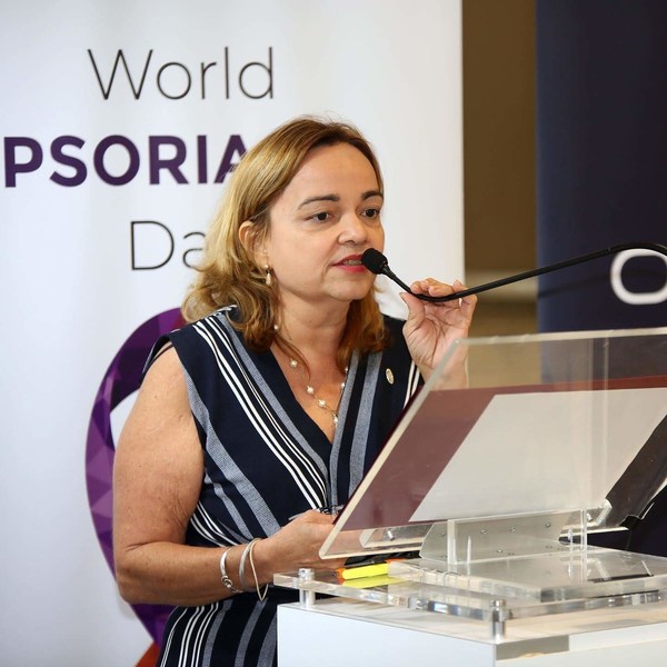 Leticia Lopez speaks at a World Psoriasis Day event in Puerto Rico