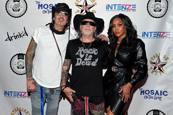 Tommy Lee, Mario Barth and Vivica Fox on the red carpet at CTS Life In Ink in Las Vegas, NV