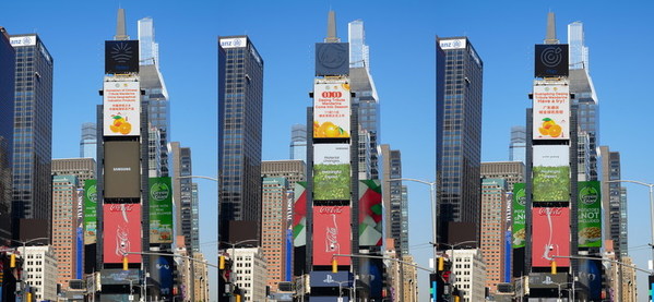 Poster themed "Deqing Tribute Mandarines" circulates on a screen at the Times Square.