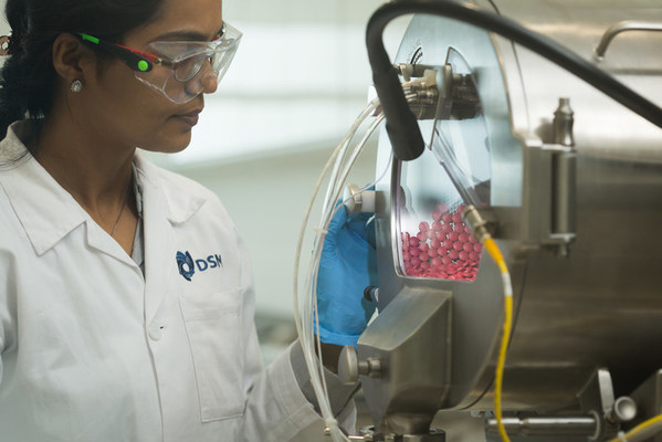 A DSM employee inspecting the manufacturing process at DSM’s Nutrition Innovation Centre in Singapore