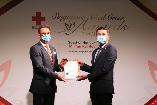 DHL honored with inaugural Singapore Red Cross United for Humanity Award (left- Carl Schelfhaut, Vice President, International Relations & Regulatory Affairs Asia Pacific of Deutsche Post International, and Head of the GoHelp Program for Asia Pacific)