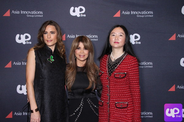 Paula Abdul (middle), Abigail Posner (left), and Christine Xu (right), AIG US CEO.