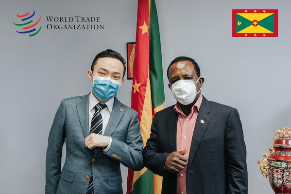 Prime Minister Dr. Keith Mitchell with H.E. Mr. Justin Sun, for his appointment as Ambassador, Permanent Representative of Grenada to the WTO