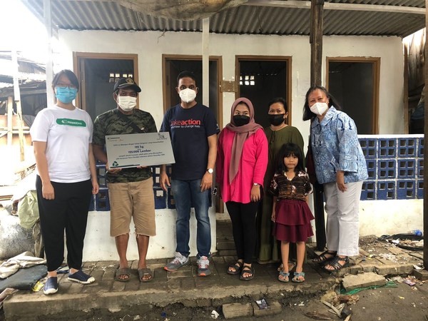 Vice President & General Manager of Novo Nordisk Indonesia when handing over the public toilet from 125 kilograms plastic waste to the Kampung Pemulung (a scavenger village) community