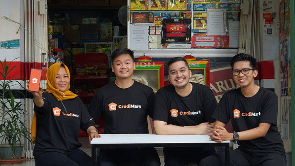 CrediBook's founders with CrediMart customer (left). The start up recently closed its $8.1M Series A funding.