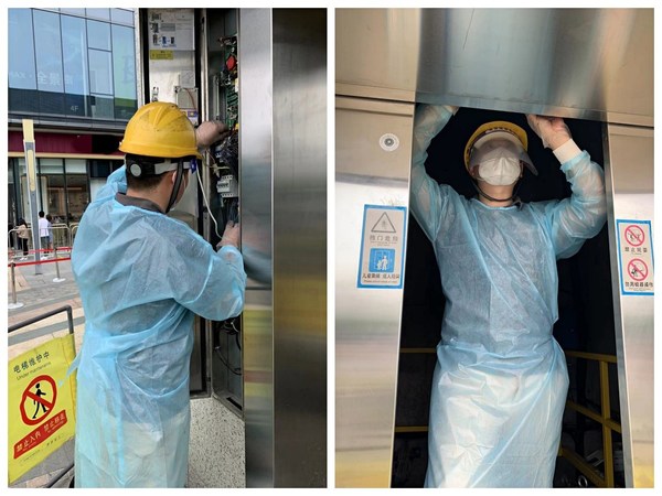 奥的斯机电员工正在对项目进行上海复工后的第一次维保作业