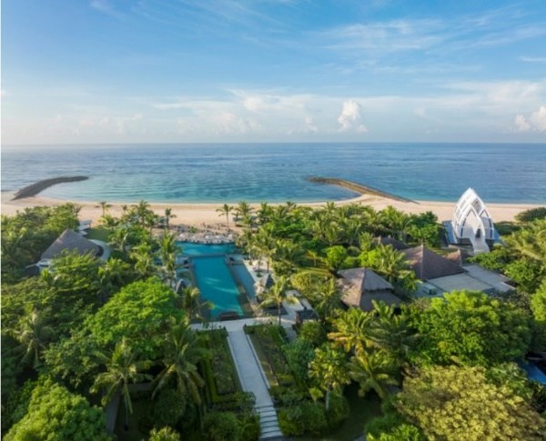 Unwind in 5-star suites with stunning views of the Nusa Dua coast