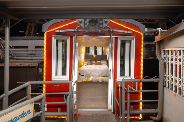 Floating on Cloud Nine: Emma Transforms Ferris Wheel Carriage into a Bedroom