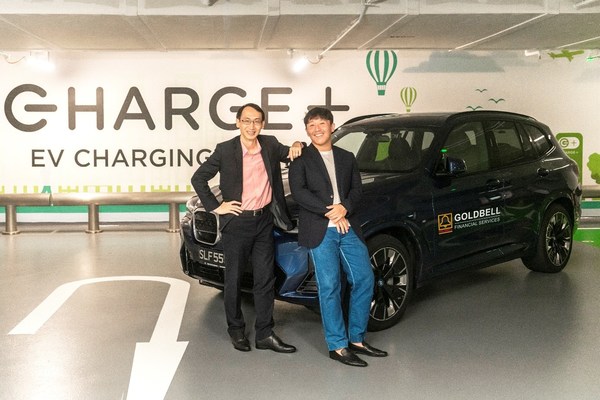 Charge+ CEO, Goh Chee Kiong (L) and Goldbell Financial Services Chairman, Alex Chua (R) at a Charge+ Charging Station at orchardgateway level 7