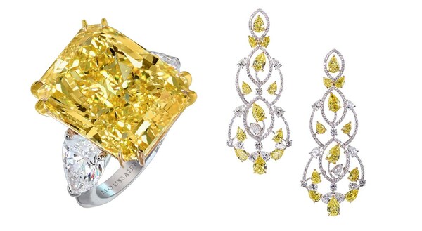Left to right:  Vivid yellow diamond ring.  Yellow diamond chandelier earrings.