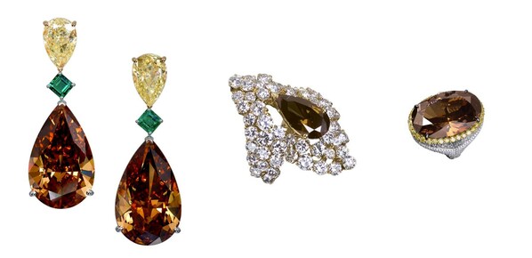 Left to right:  Brown & yellow diamond, emerald earrings.  Orangey brown diamond ring. Brown diamond dress ring.