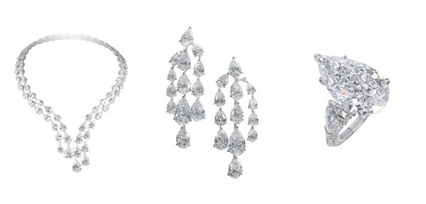 Left to right:  Diamond hair ornament/necklace.  Diamond earrings.  Diamond ring.