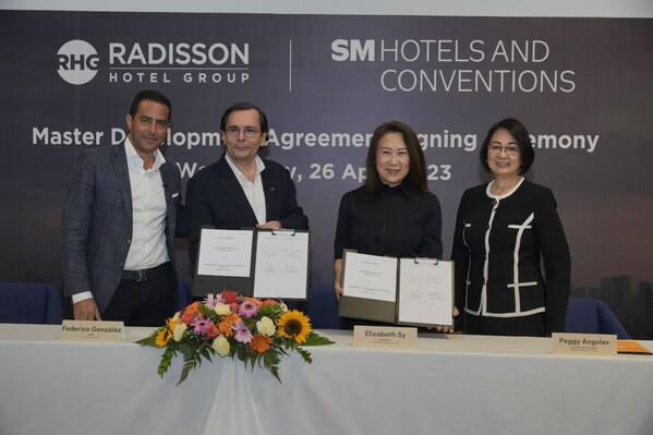 (L-R) Radisson Hotel Group (RHG) APAC Chief Development Officer Ramzy Fenianos, RHG Chief Executive Officer Federico Gonzalez, SM Hotels and Conventions Corp. (SMHCC) President Elizabeth Sy, and SMHCC Executive Vice President Peggy Angeles, at the Master Development Agreement (MDA) signing ceremony.