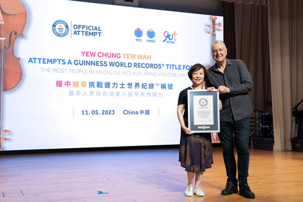 The melody was composed by Jeremy Williams (right), Music Director, Yew Chung Yew Wah Education Network.