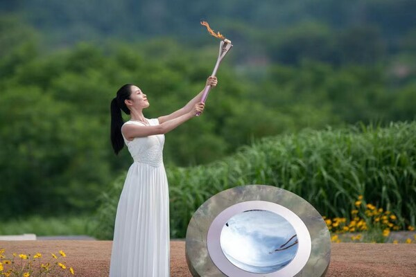 The flame is lit during the Hangzhou 2022 Asian Games Flame Lighting Ceremony at the Archaeological Ruins of Liangzhu City Park in Hangzhou, east China's Zhejiang Province, on June 15, 2023.[Photo/Xinhua]