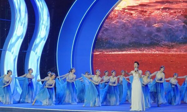 Performers are staging a dance with a song, "Hometown, the Sea", at the opening ceremony.