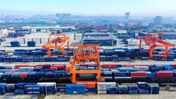 An aerial view of cranes working at the bustling Chengdu International Railway Port.