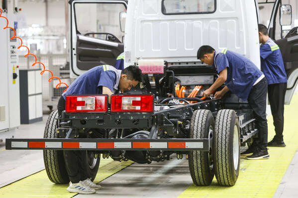 In Guian New Area, Guizhou province, technicians from Guizhou Changjiang Automobile Co are conducting tests on the soon-to-be-launched pure electric light truck. [Photo by Shi Zhaochang/provided to China Daily]