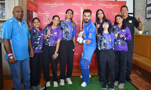 Members and players of the Singapore Cricket Association at the launch of Virat Kohli’s wax figure (Photo: Madame Tussauds Singapore)