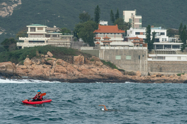 Five teams, consisting of 30 elite swimmers and business leaders, will embark on a challenging 45-kilometre relay swim around Hong Kong Island on November 4th, 2023. (Photo credit: Anthony Kwan)