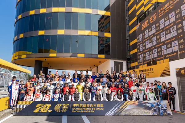 Sands China Ltd. President Dr. Wilfred Wong, company executives and other team members experience the exciting atmosphere of the 70th Macau Grand Prix Nov. 15. Sands China was a major sponsor of this year’s event. (PRNewsfoto/)