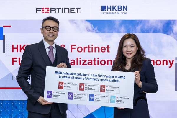 Breaking ground with yet another first in Asia for HKBN! (Pictured from left) Martin Ip, HKBN Co-Owner, Chief Technology Officer &amp; Vice President of Sales Engineering, Enterprise Solutions; and Cherry Fung, Regional Director, Hong Kong, Macau and Mongolia, Fortinet.