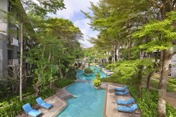 Nestled in the heart of our resort, the lagoon pool measures 97 x 33 meters and is surrounded with lush tropical gardens and an array of pool loungers. (PRNewsfoto/Courtyard by Marriott Bali Nusa Dua Resort)