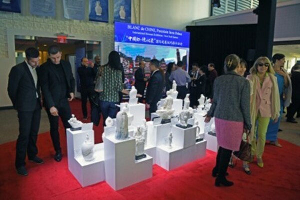 People attend the "BLANC de CHINE - Porcelain from Dehua" international exhibition in New York