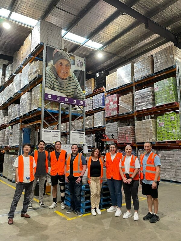 Employees from Allianz Partners Australia volunteering at the Foodbank Queensland warehouse.