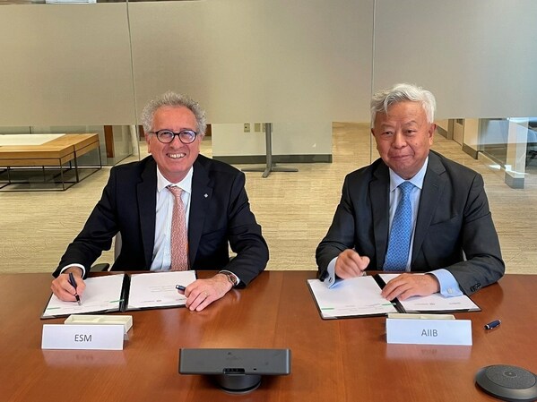 ESM Managing Director Pierre Gramegna and AIIB President Jin Liqun at signing of the MOU (PRNewsfoto/AIIB)
