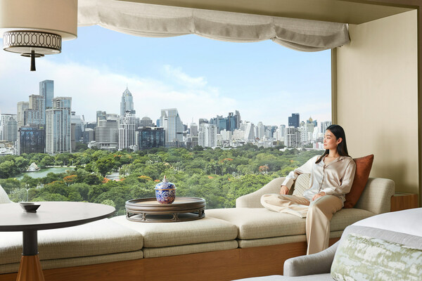 Every guest room at the new Dusit Thani Bangkok features floor-to-ceiling windows framing uninterrupted views of Lumpini Park.
