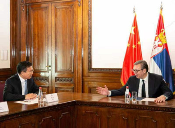 Serbian President Aleksandar Vucic meets with visiting President of Xinhua News Agency Fu Hua in Belgrade, Serbia, on April 30, 2024.