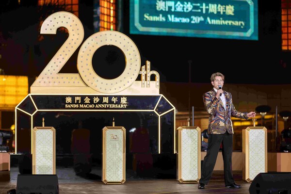 Local singer German Ku delivers an outstanding performance at the opening of Sands Macao’s 20th anniversary celebration Thursday at the hotel and entertainment complex’s outdoor fountain. (PRNewsfoto/Sands China Ltd.)