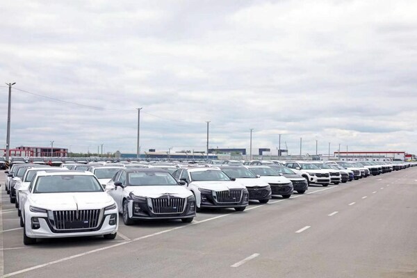 Allur, acquired and restructured by a Chinese company, is the largest automotive manufacturing and assembly enterprise in Kazakhstan. Photo shows vehicles parked at a production base of Allur, waiting to be distributed to different regions in Kazakhstan. (Photo by Zhao Yipu/People's Daily)