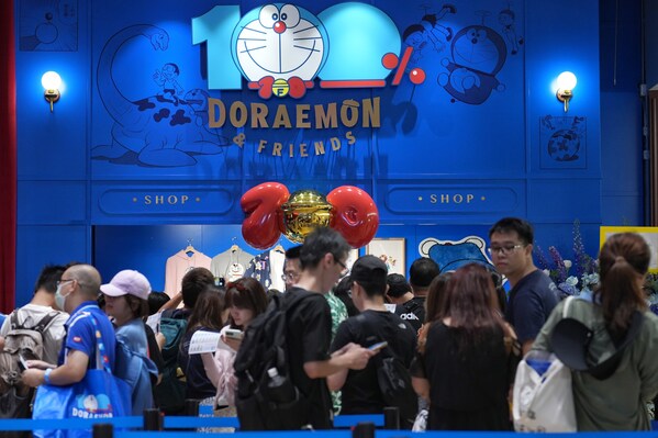 Fans of Doraemon buying merchandise at pop-up store