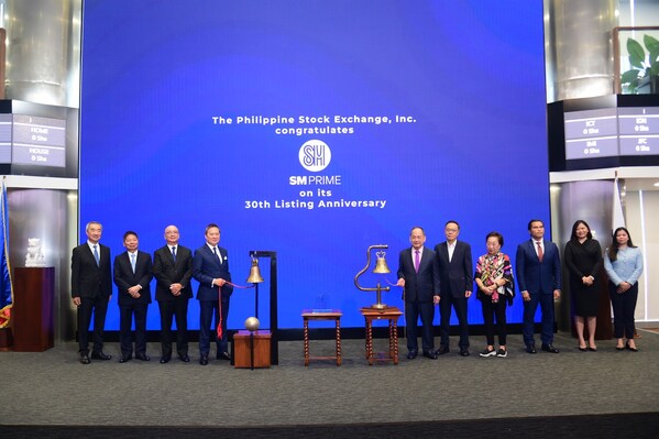 Marking 30 Years of Shared Prosperity: SM Prime Holdings' Board of Directors Hans T. Sy, Amando M. Tetangco, Jr. (concurrently SM Investments Chairman), Jeffrey C. Lim, and Henry T. Sy, Jr. lead a bell-ringing ceremony with Philippine Stock Exchange's President and CEO Ramon S. Monzon, Directors Eddie T. Gobing and Ma. Vivian Yuchengco, COO Roel A. Refran, Issuer Regulation Division Head Marigel M. Baniqued-Garcia, and General Counsel Veronica V. Del Rosario. (PRNewsfoto/SM Investments Corporation)