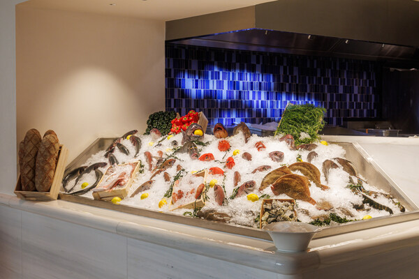The fish market showcases over 15 varieties of fish flown from Greece and the Mediterranean daily.