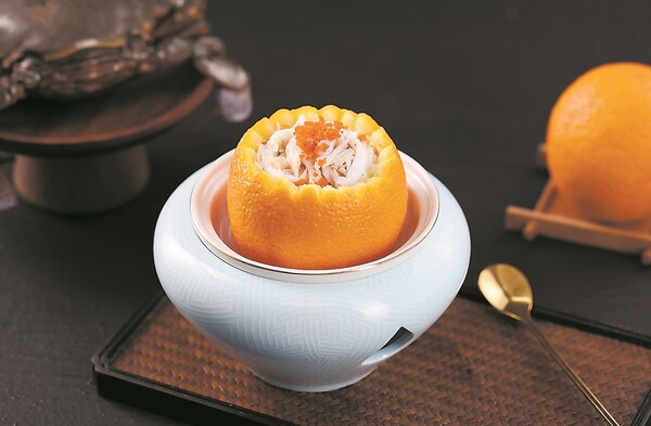 Photo shows a Quanzhou delicacy made from crabs and oranges. (PRNewsfoto/Xinhua Silk Road)