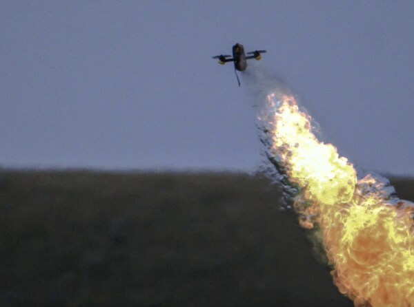 An FPV drone carrying a payload that has been neutralised with the Fractl Tactical Directed Energy System via the "vent and burn" method