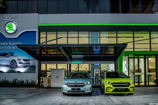 Two Skoda electric vehicles charging on an EV charging station Powered by Noodoe.