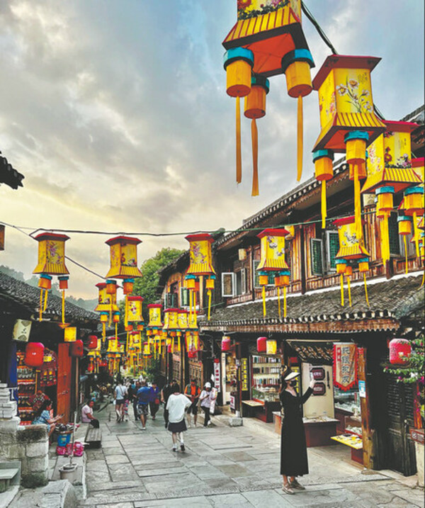 The six-century-old town of Qingyan on the outskirts of Guiyang, Guizhou province, is a small military outpost that today serves as a major tourism destination which welcomes mass incursions by visitors from far beyond its borders.  ERIK NILSSON/CHINA DAILY