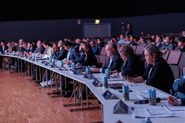 A panel of judges is evaluating the final round of the HIS Challenge held in 2024 IAC, Milan, Italy